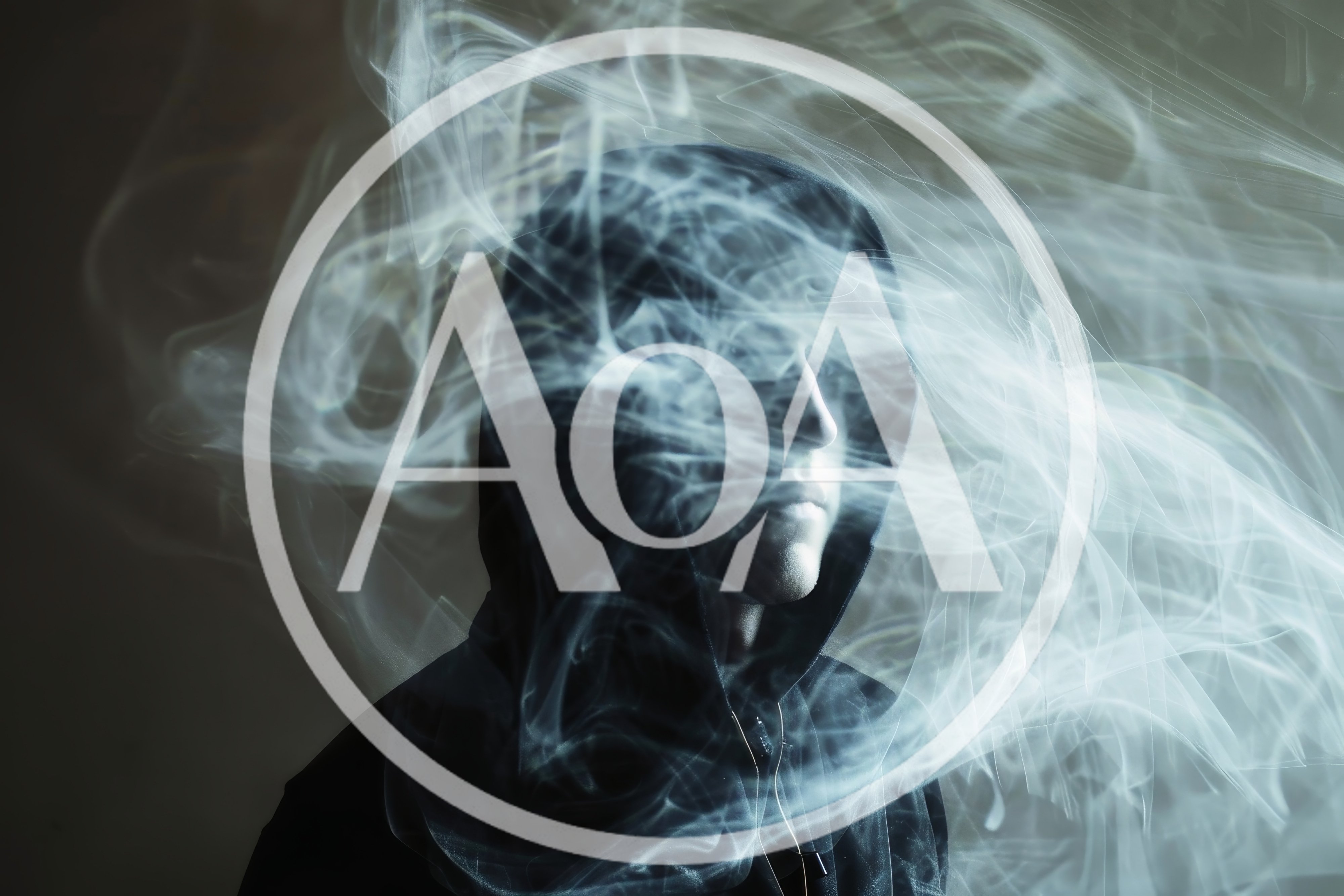 Man Wearing Hood Surrounded By Swirling White Smoke