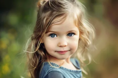 Portrait Of A Young Girl With Blue Eyes