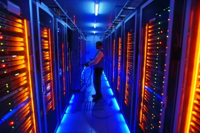 IT Technician Working In A Modern Data Center
