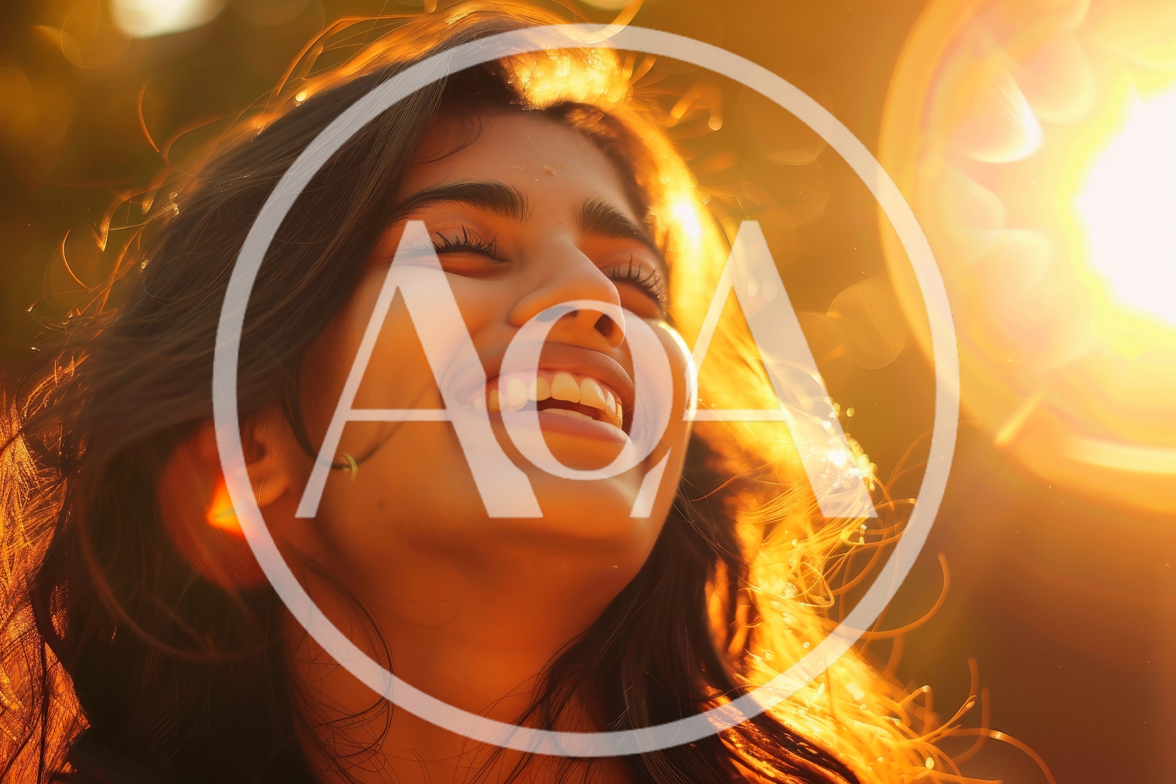 Young Woman Laughing Outdoors In Golden Hour Sunlight