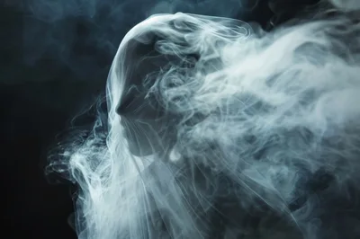 Ethereal Human Silhouette Enveloped In Swirling White Smoke