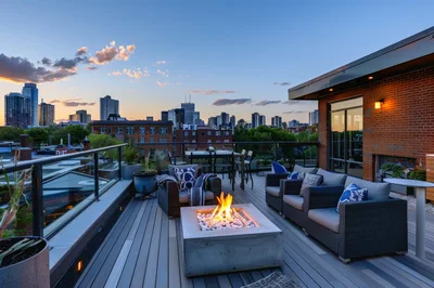 Modern Rooftop Terrace With Fire Pit At Sunset
