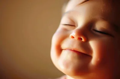 Close Up Portrait Of A Smiling Baby