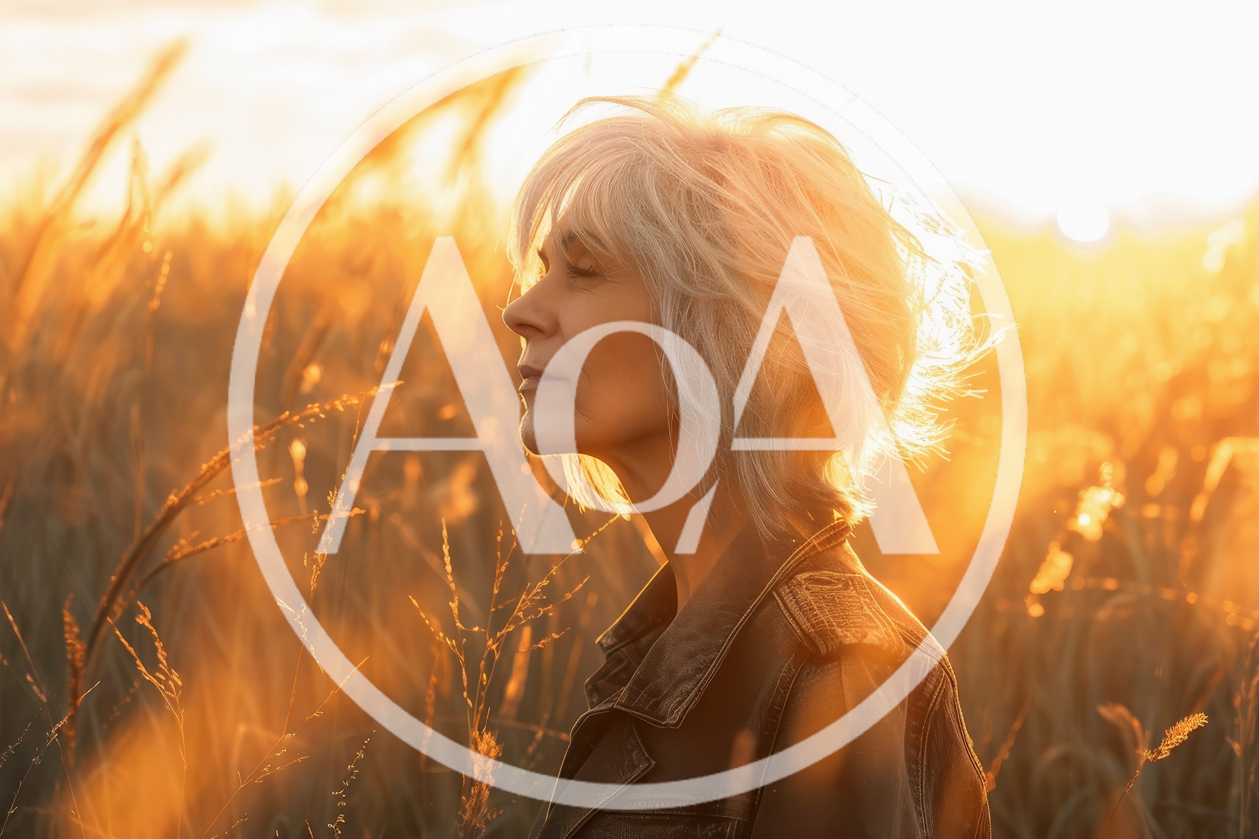 Mature Woman Enjoying Sunset In A Golden Field
