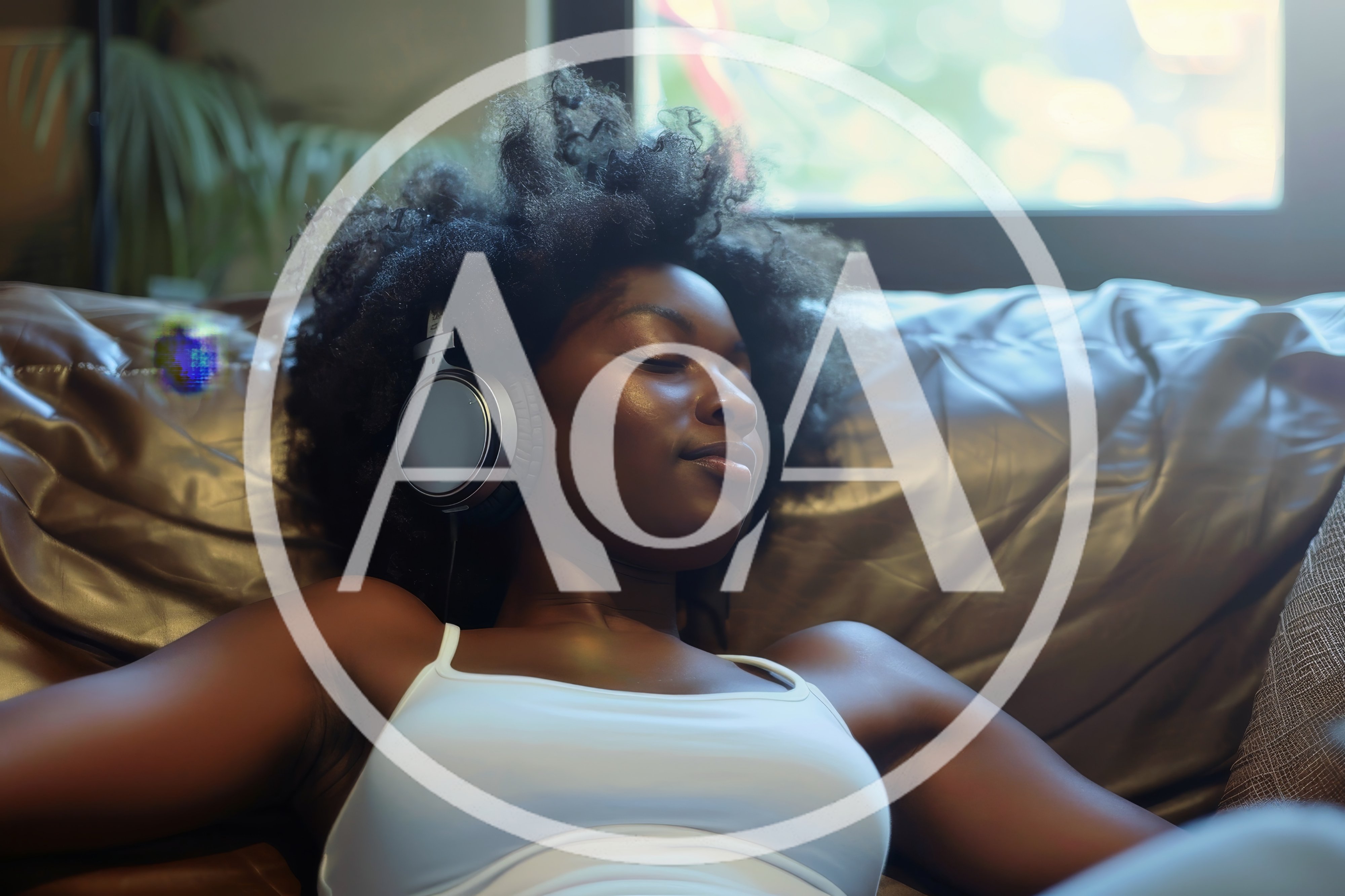 Young Woman Relaxing On Sofa With Headphones