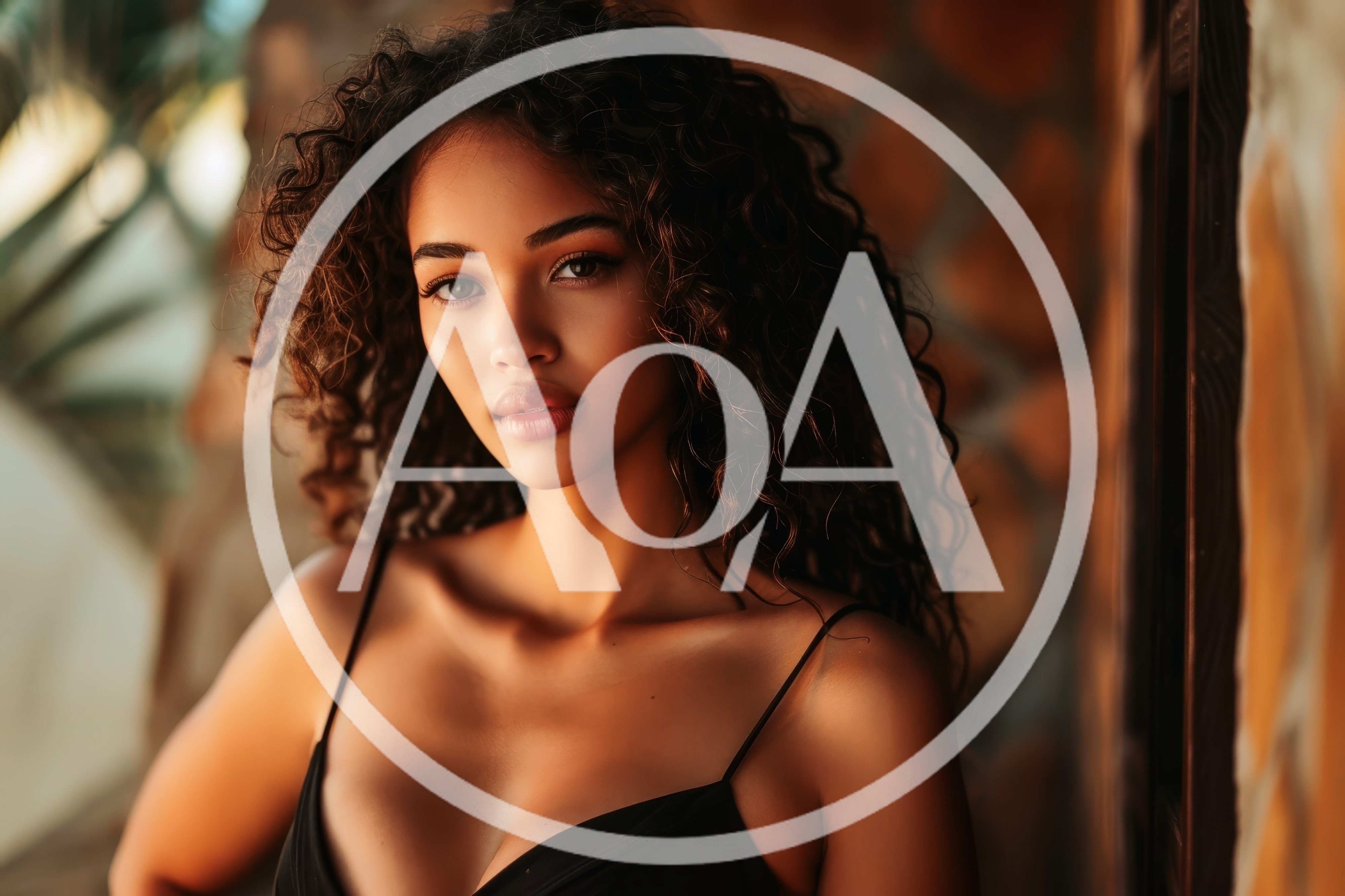 Portrait Of A Beautiful Young Woman With Curly Hair