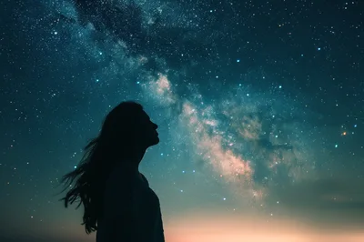 Silhouette Of A Woman Looking At The Milky Way