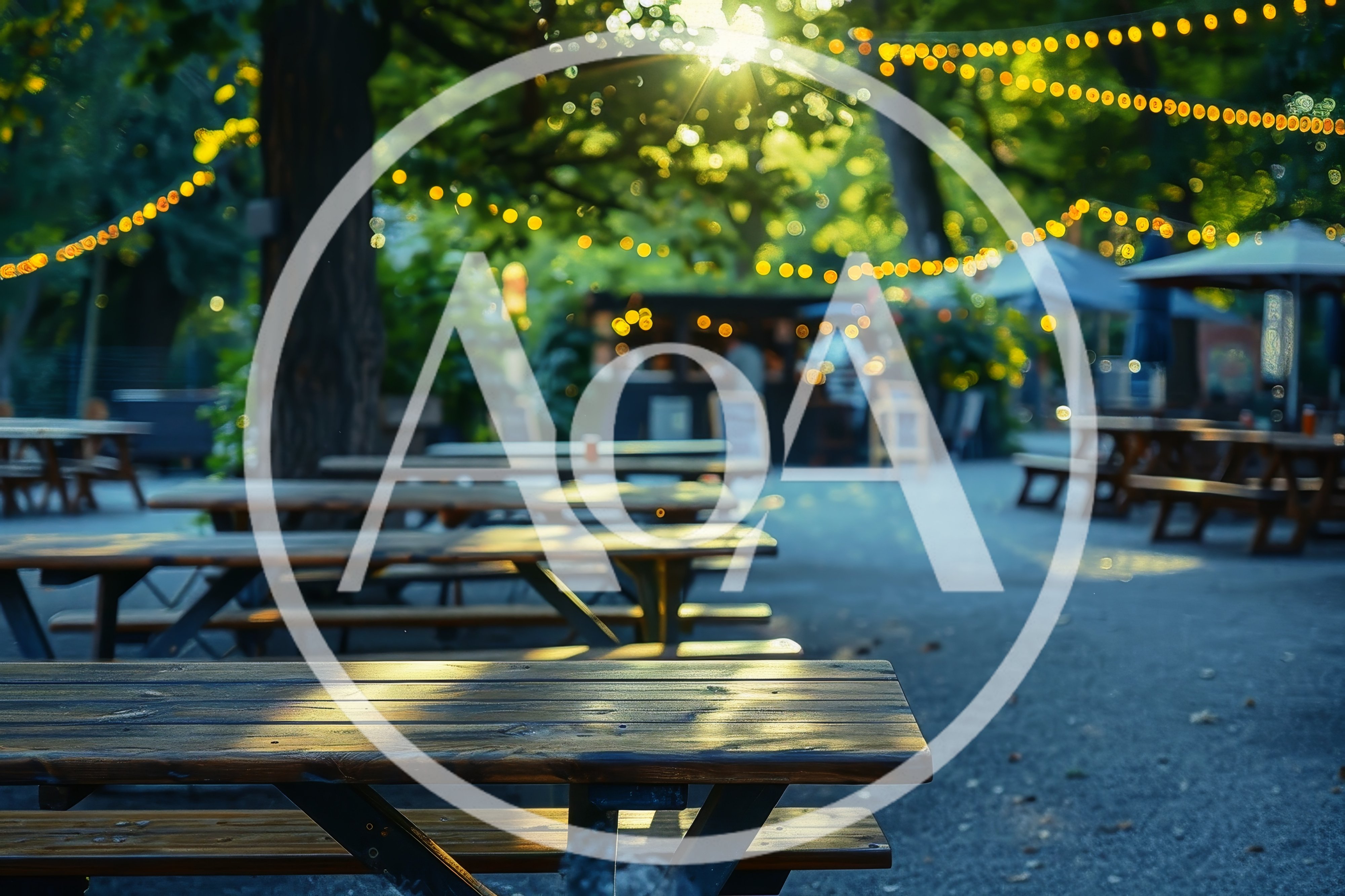 Empty Wooden Picnic Tables In An Outdoor Beer Garden