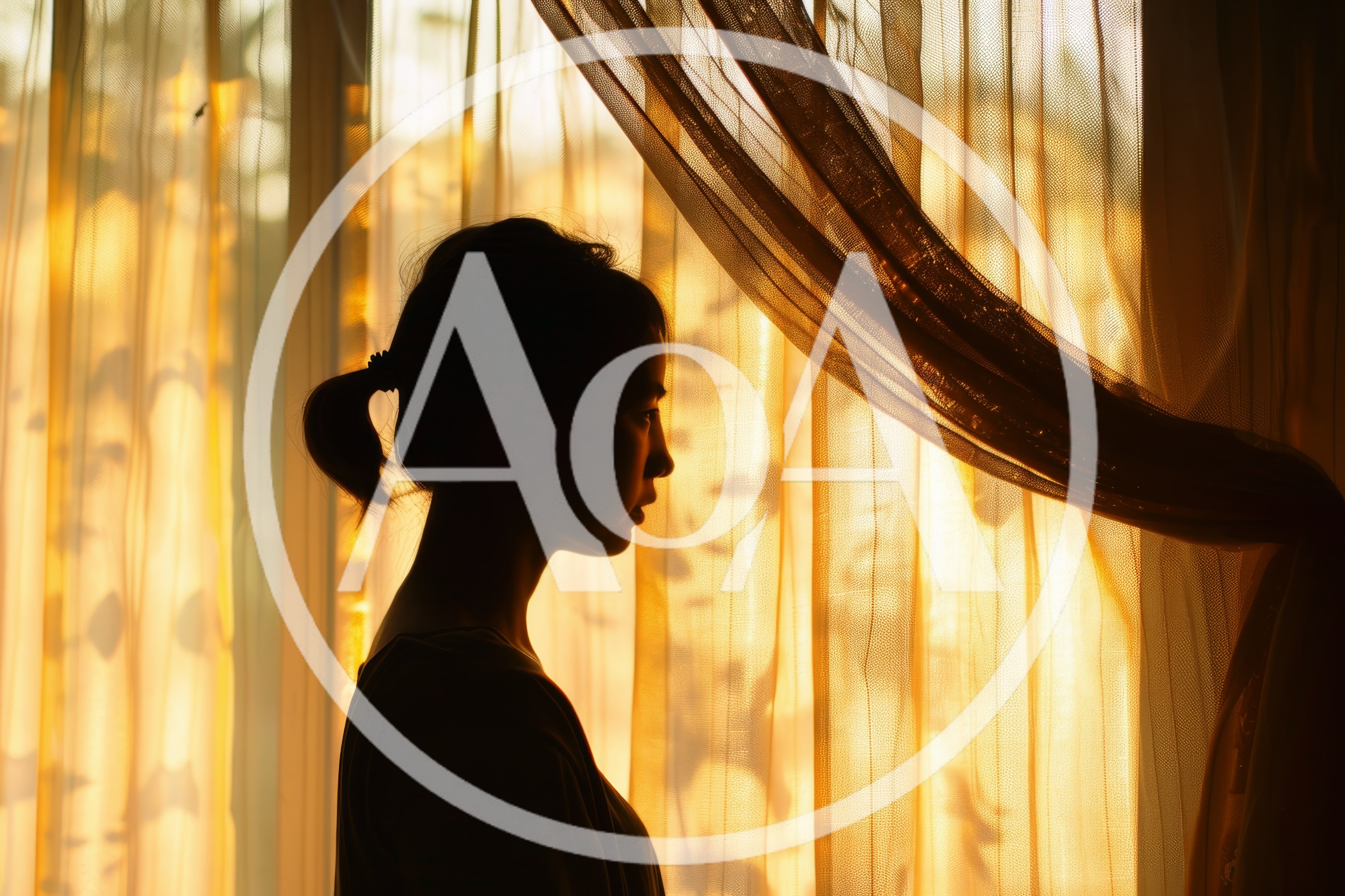 Silhouette Of A Young Woman Standing By A Window
