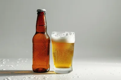 Brown Beer Bottle and Glass of Beer
