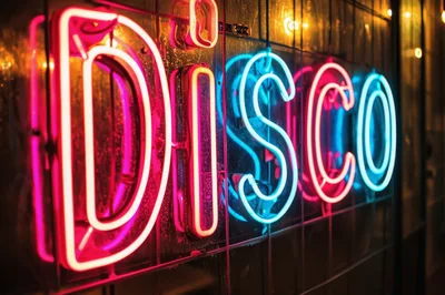 Neon Disco Sign Glowing On A Glass Wall