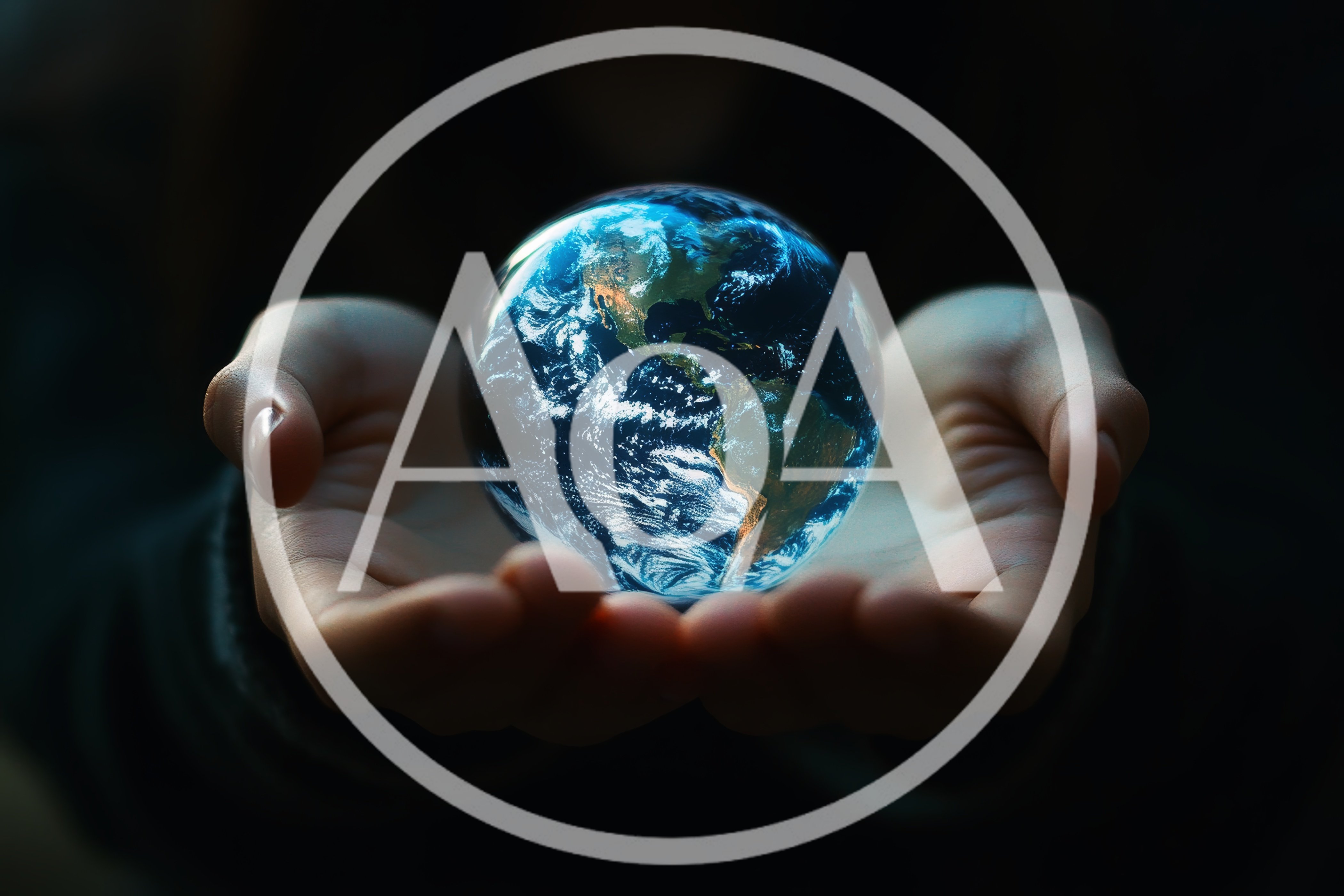 Human Hands Holding A Glowing Earth Globe