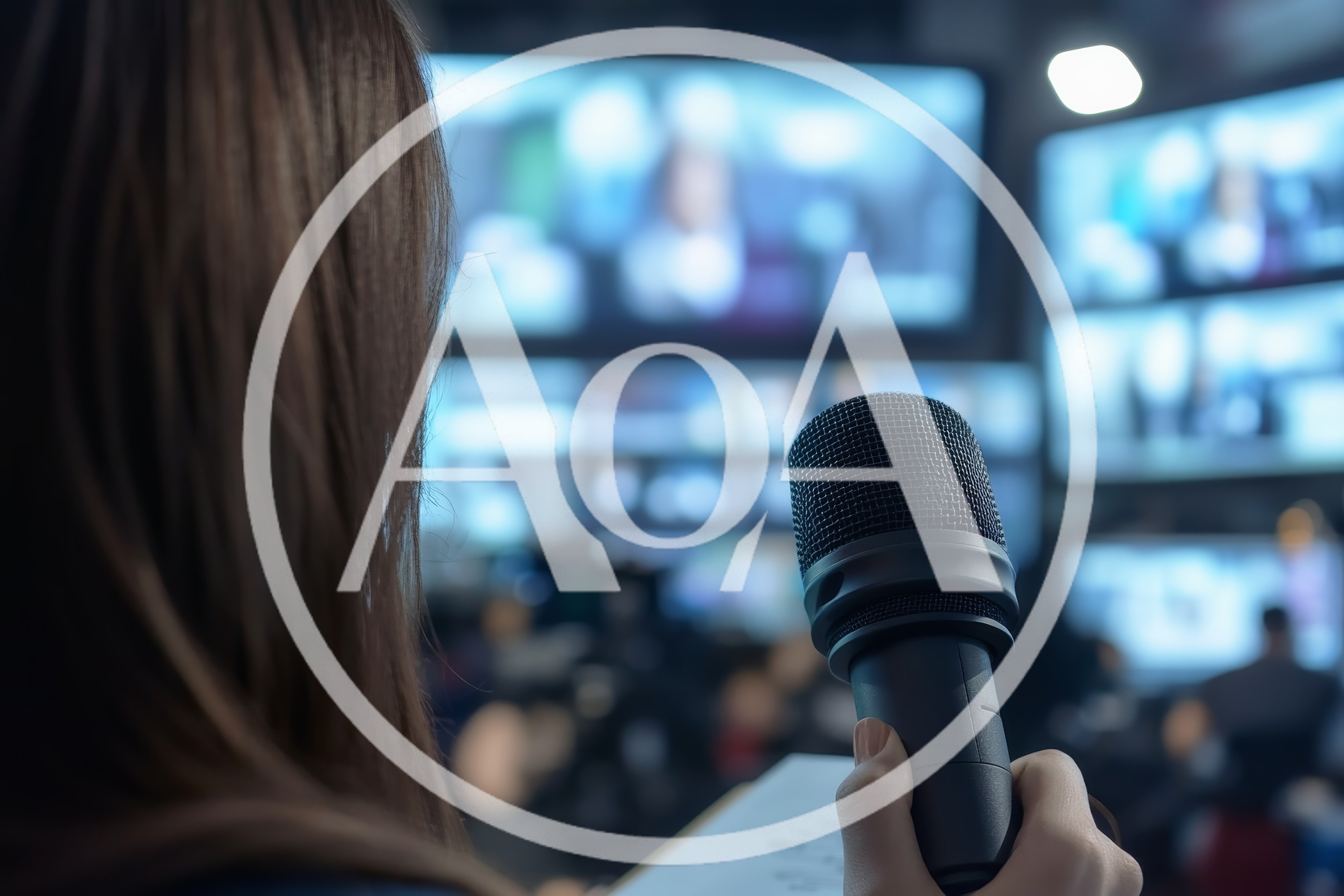 News Reporter Holding Microphone In Television Broadcast Studio