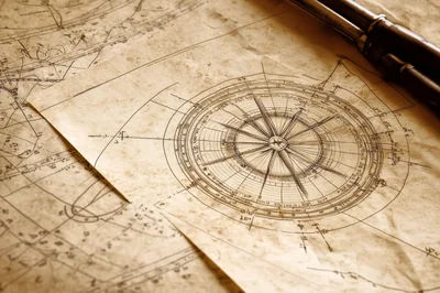 Vintage Nautical Compass Drawing On Aged Parchment Paper