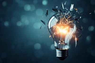 Shattering Light Bulb With Glowing Filament