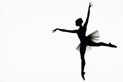 Silhouette Of A Ballerina Performing A Graceful Leap