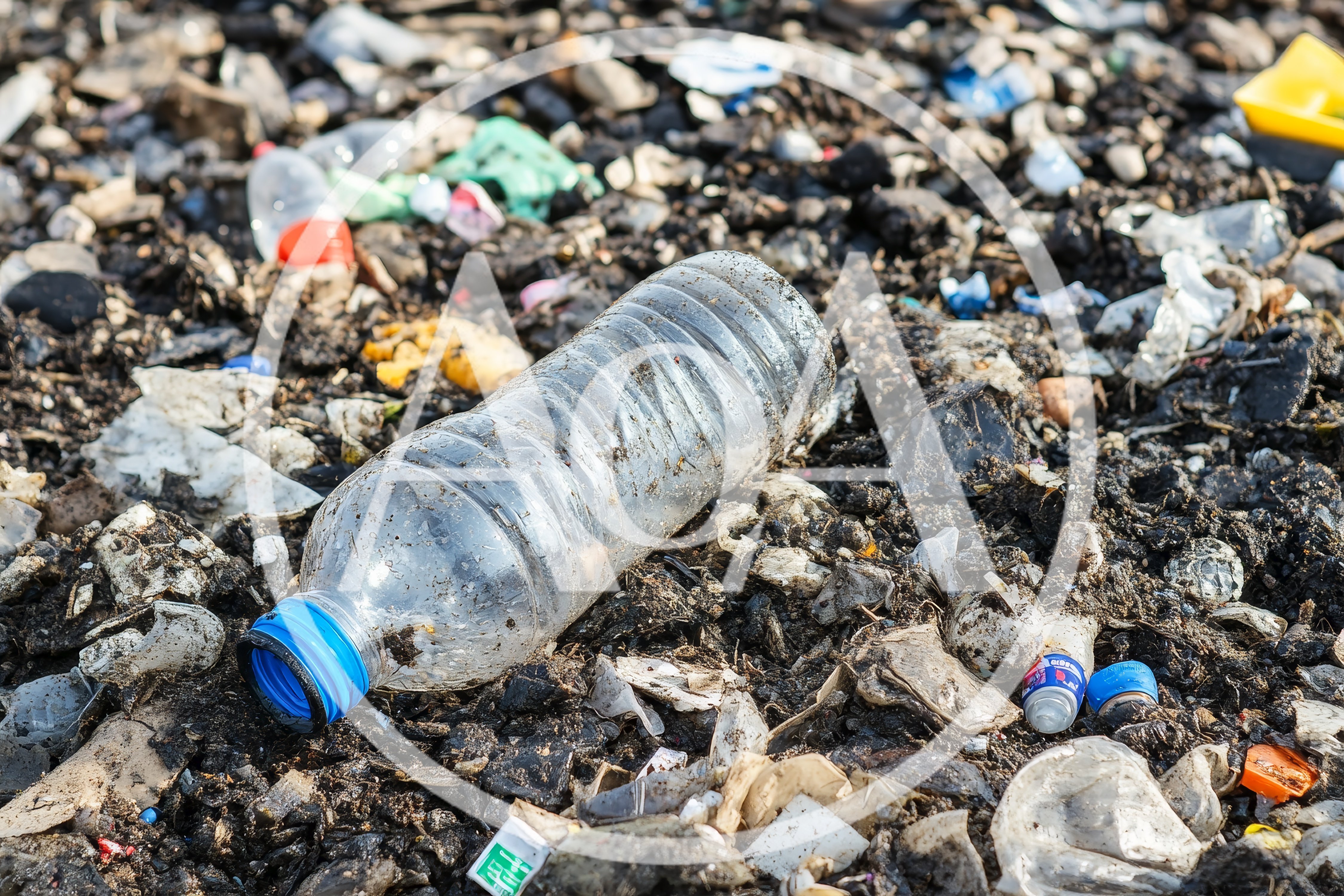 Plastic Bottle Littering A Polluted Landfill Site