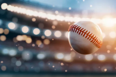 Baseball Flying Through The Air At A Stadium