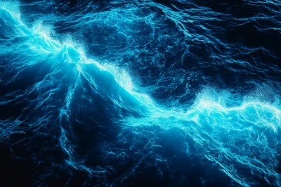 Bioluminescent Waves Crashing In Deep Ocean Waters