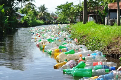 Plastic Waste Polluting A Narrow Tropical Canal