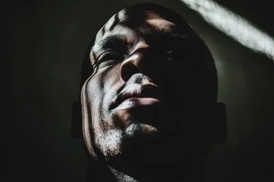 Close Up Portrait Of A Man With Dramatic Lighting