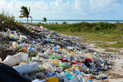 Massive Pile Of Plastic Waste On Tropical Beach