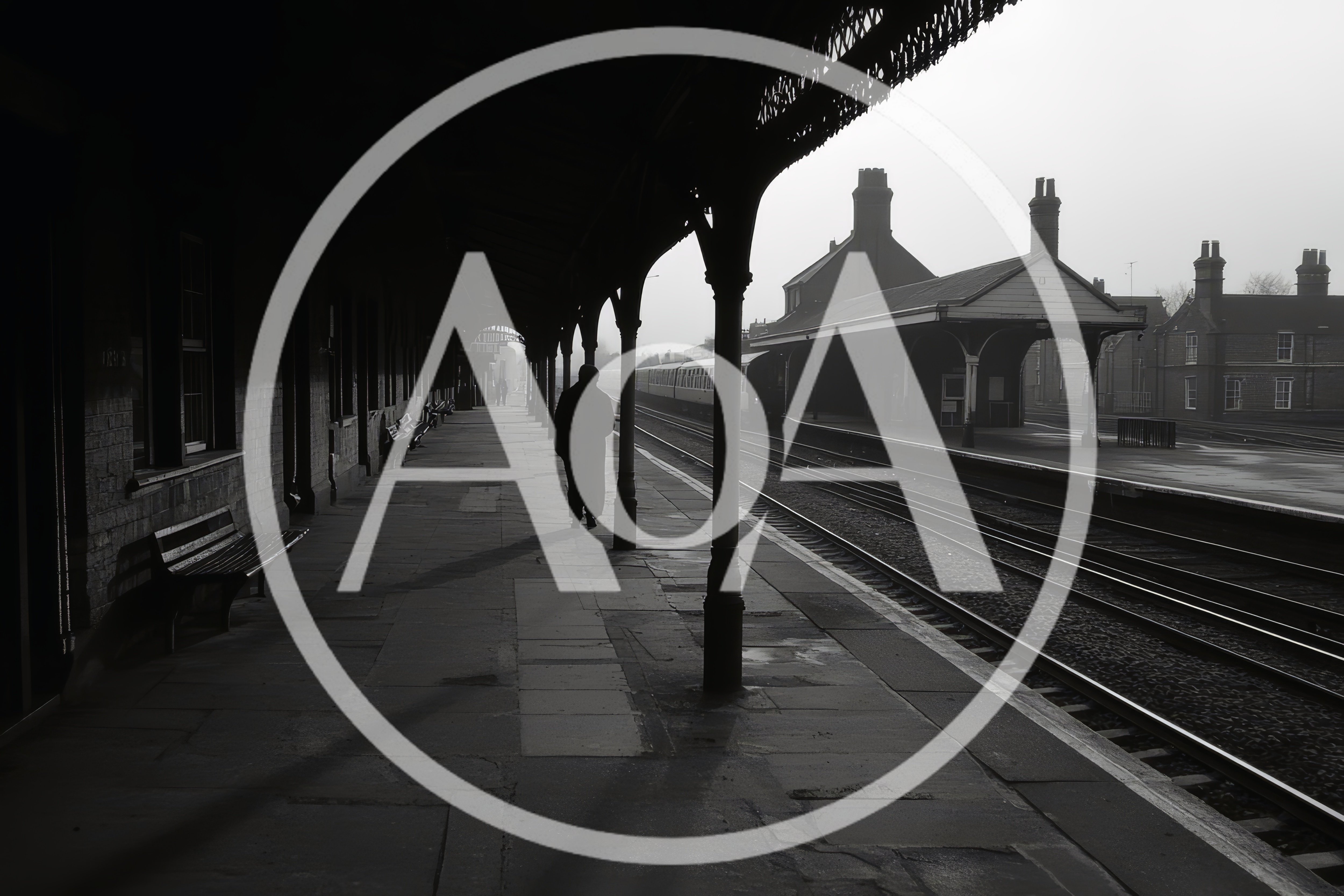 Lone Commuter Walking Along A Historic Train Station Platform