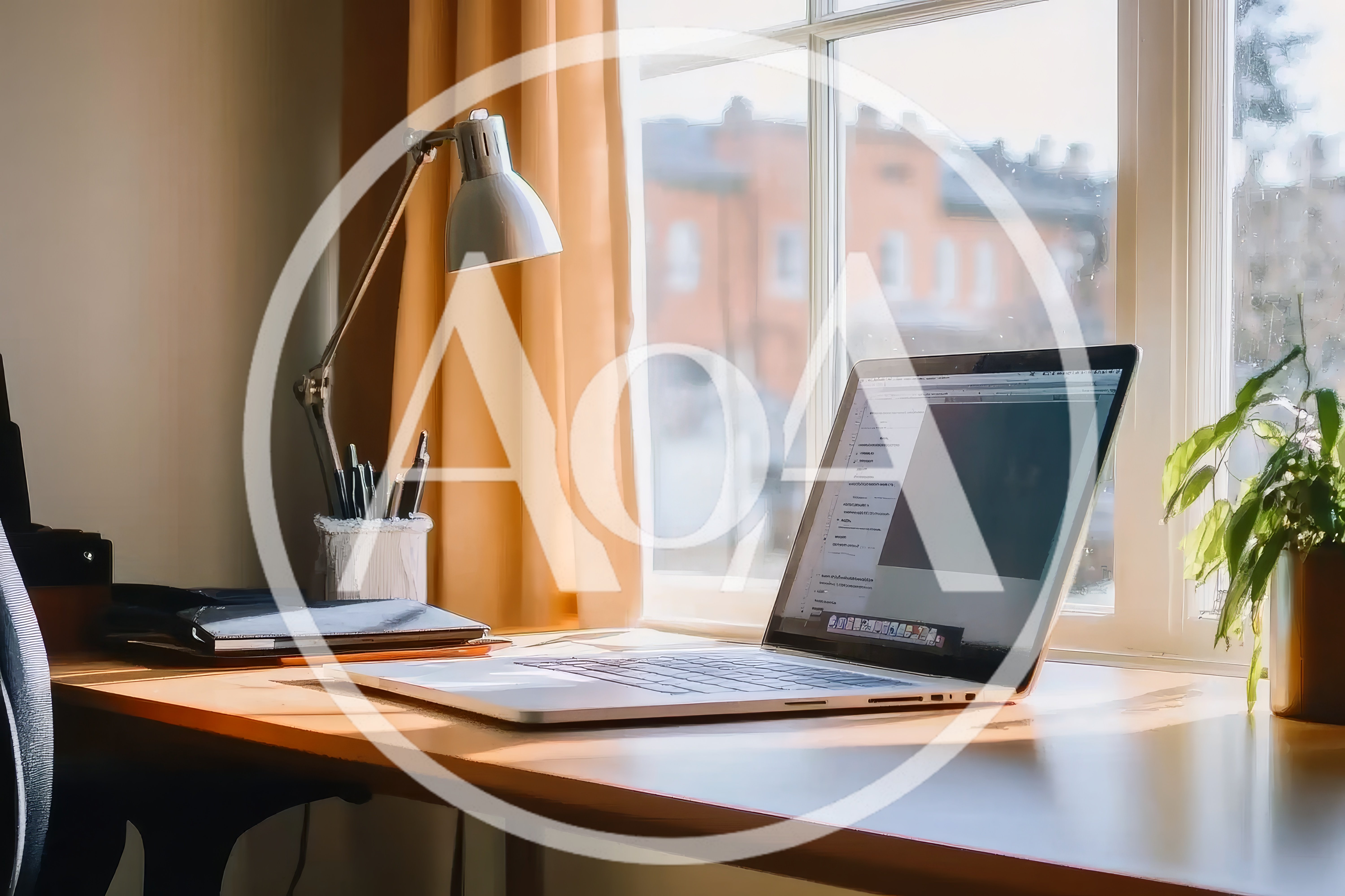 Laptop On A Desk By A Sunny Window