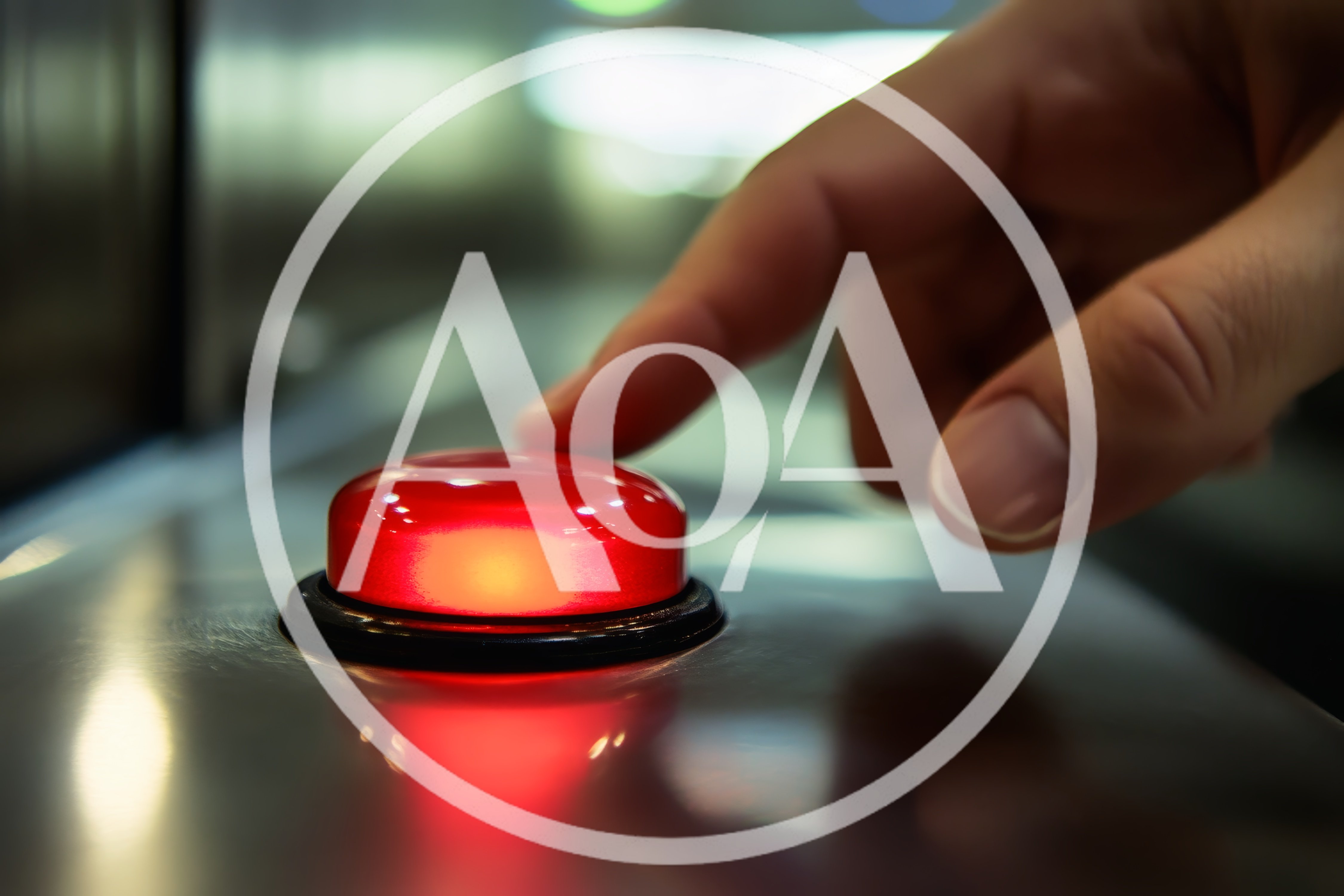 Finger Pressing A Glowing Red Emergency Button