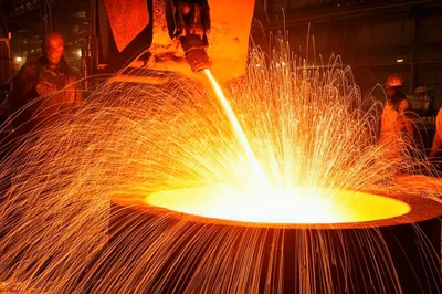 Molten Metal Pouring Into Industrial Casting Crucible