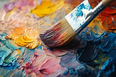 Artist Paintbrush Applying Thick Oil Paint On Canvas