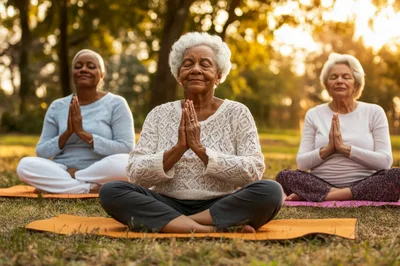 Three Senior Women Practicing Yoga Outdoors
