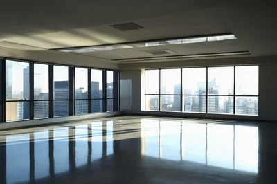 Empty Modern Office Space With City Skyline View
