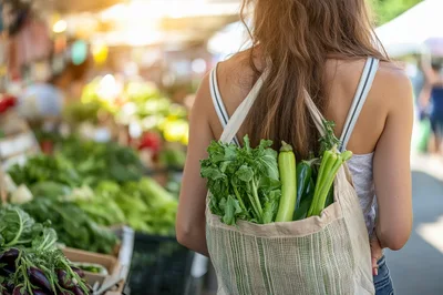 Woman Carrying Fresh Vegetables In A Market Tote Bag