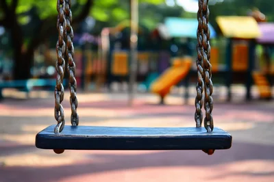 Empty Swing Set In A Public Playground