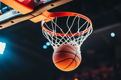 Basketball Passing Through The Hoop Net