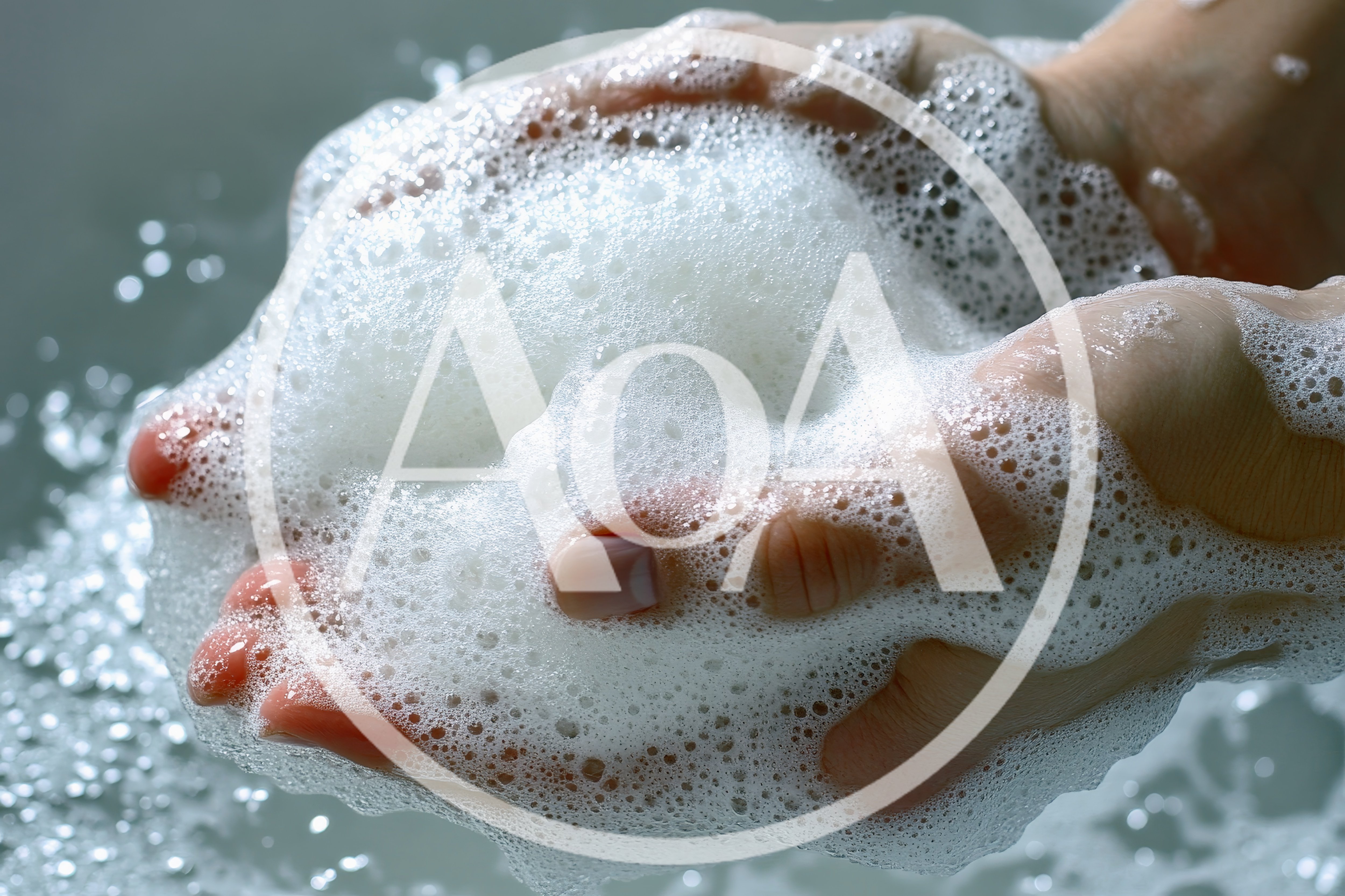 Hands Cupped Holding Thick White Soap Lather