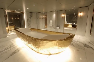 Luxurious Gold Bathtub in Modern Marble Bathroom