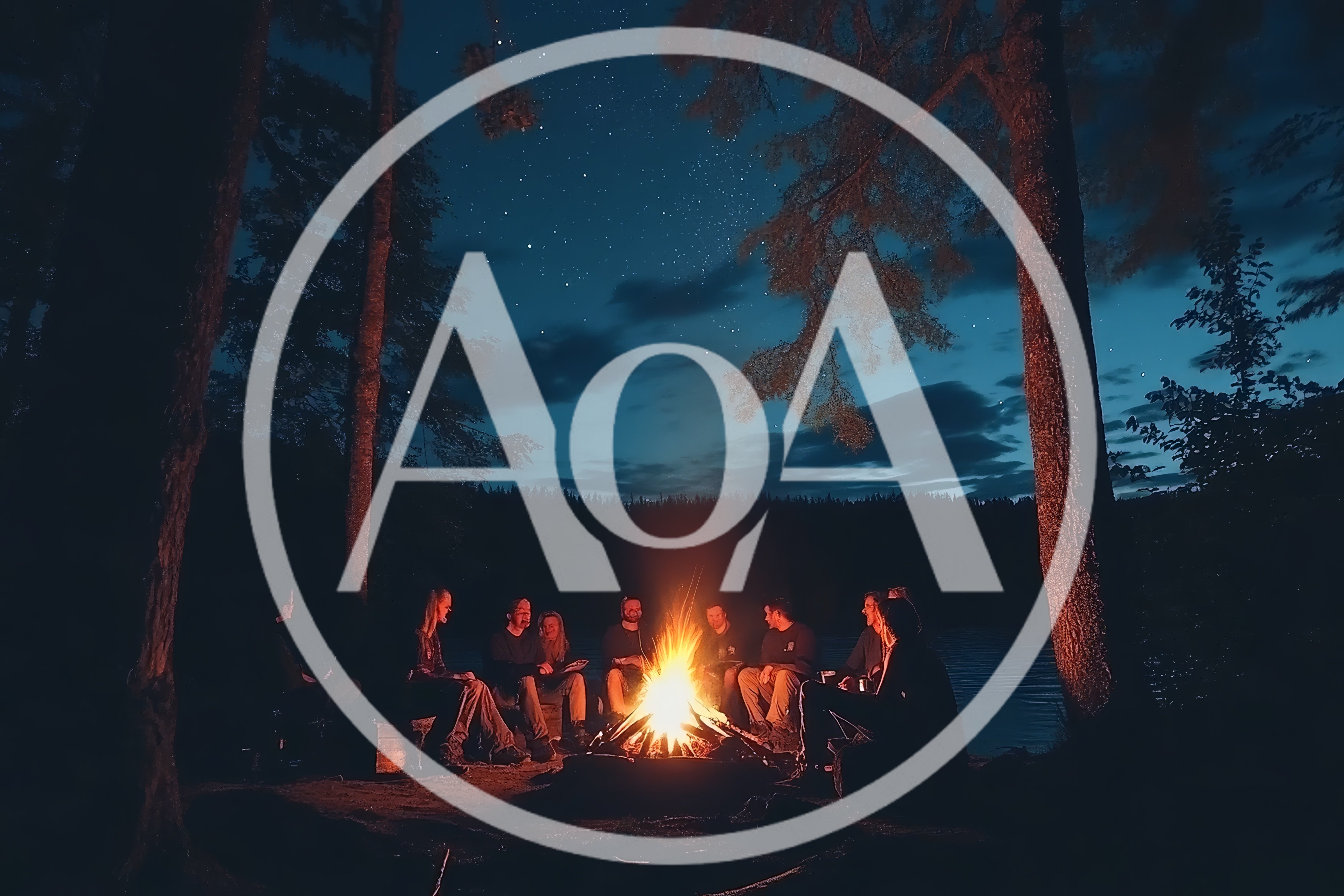 Group Of Friends Sitting Around A Campfire At Night
