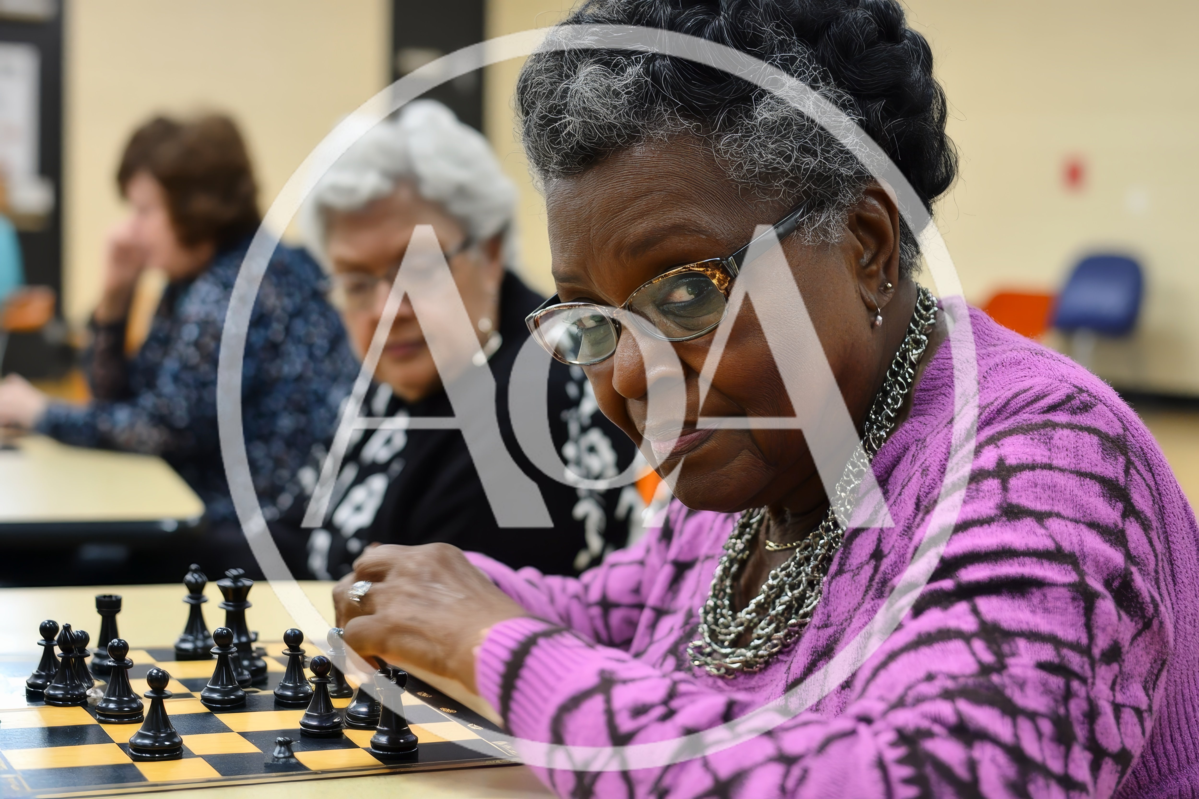 Senior Women Playing Chess In A Community Center