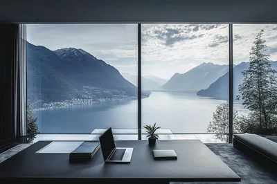 Modern Office Desk Overlooking Scenic Mountain Lake View
