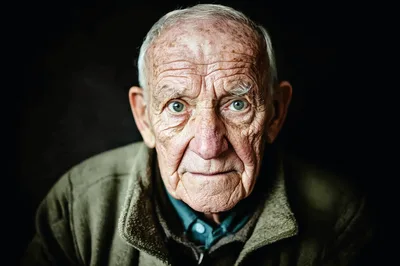 Portrait Of An Elderly Man With Deep Wrinkles