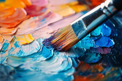 Artist Paintbrush Applying Thick Oil Paint On Canvas