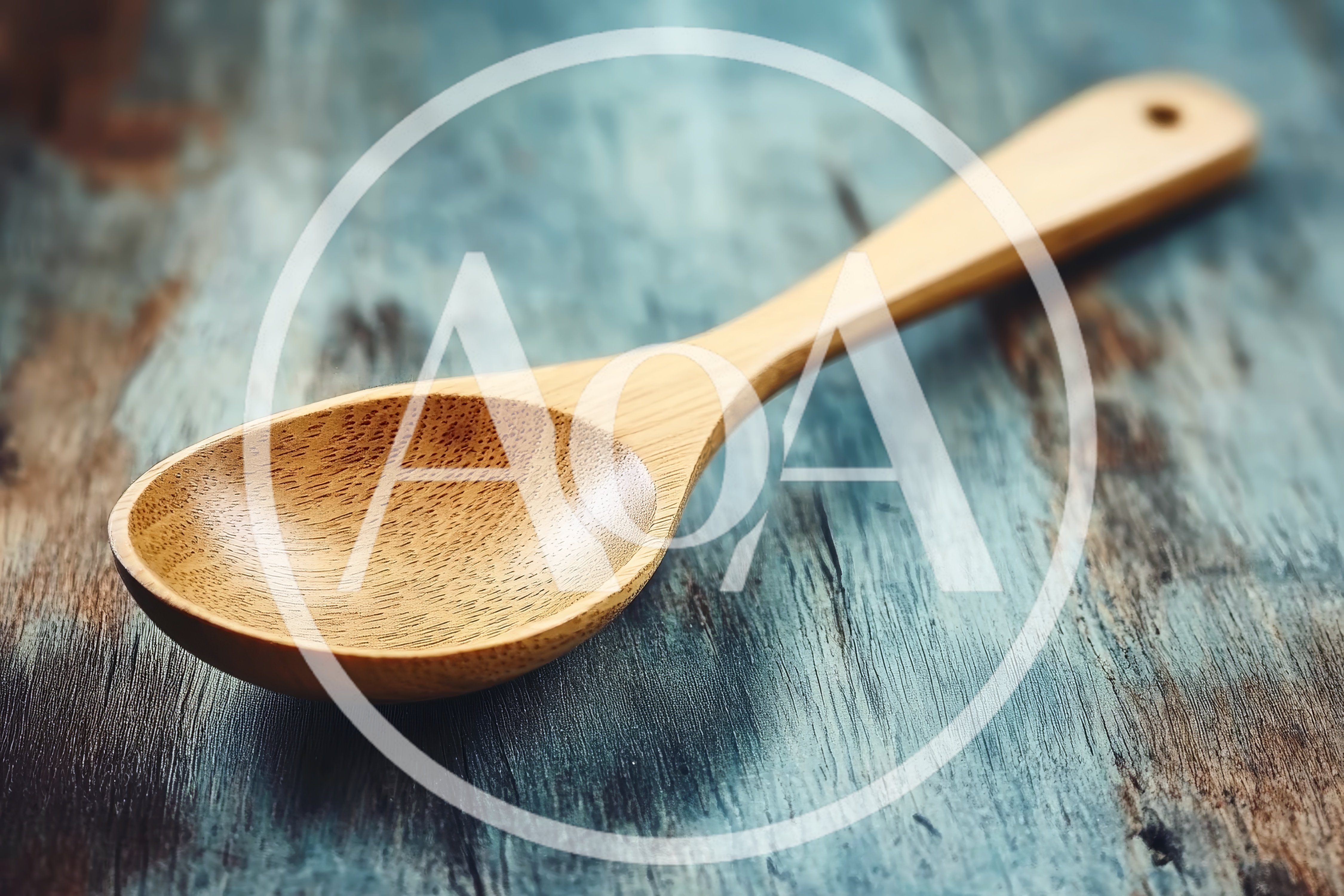 Wooden Spoon Resting On A Rustic Blue Wooden Surface