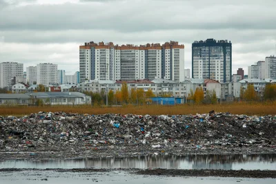 Large Illegal Garbage Dump Near Residential Apartment Buildings