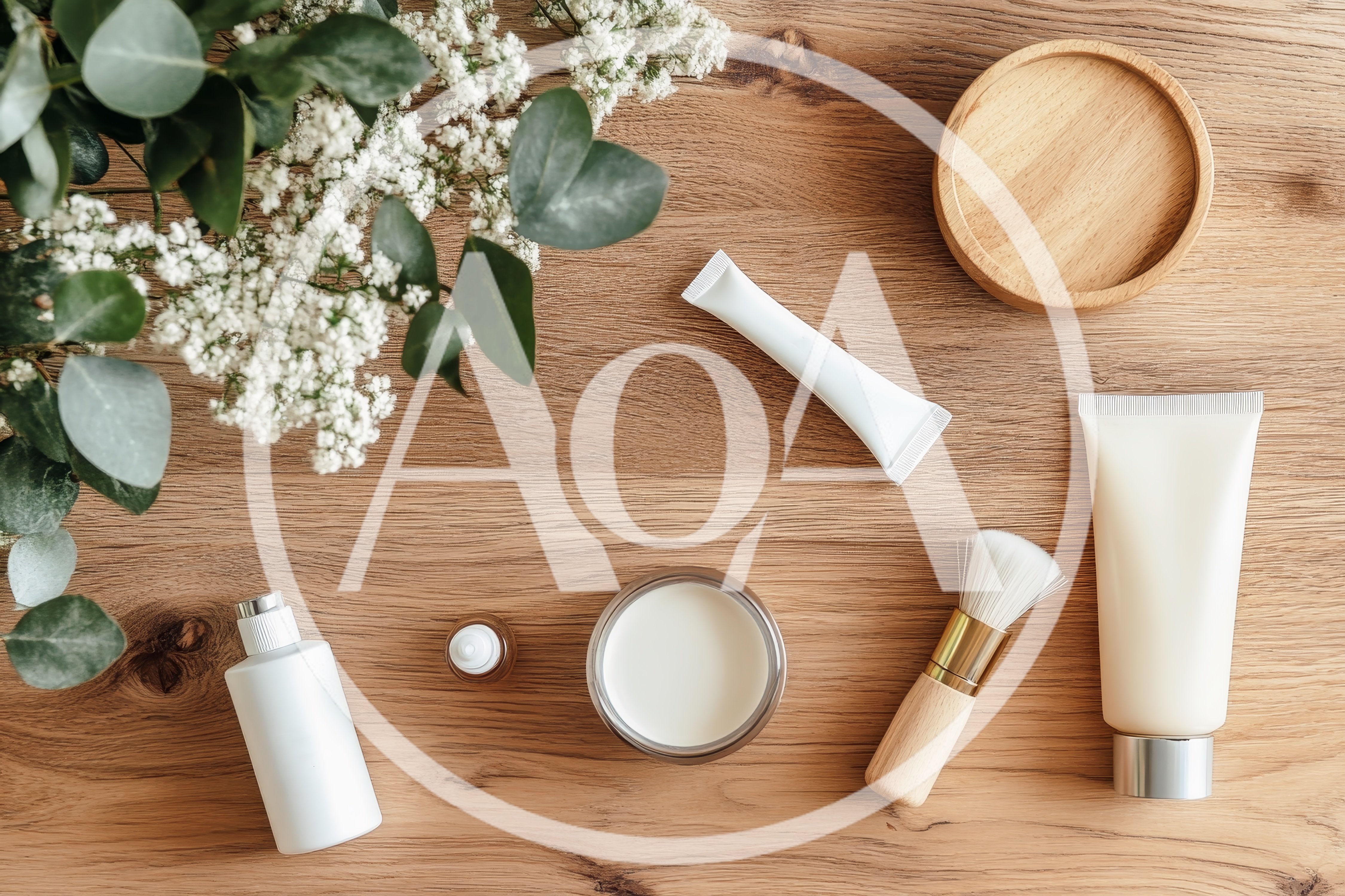Flat Lay Skincare Products With Eucalyptus And Flowers