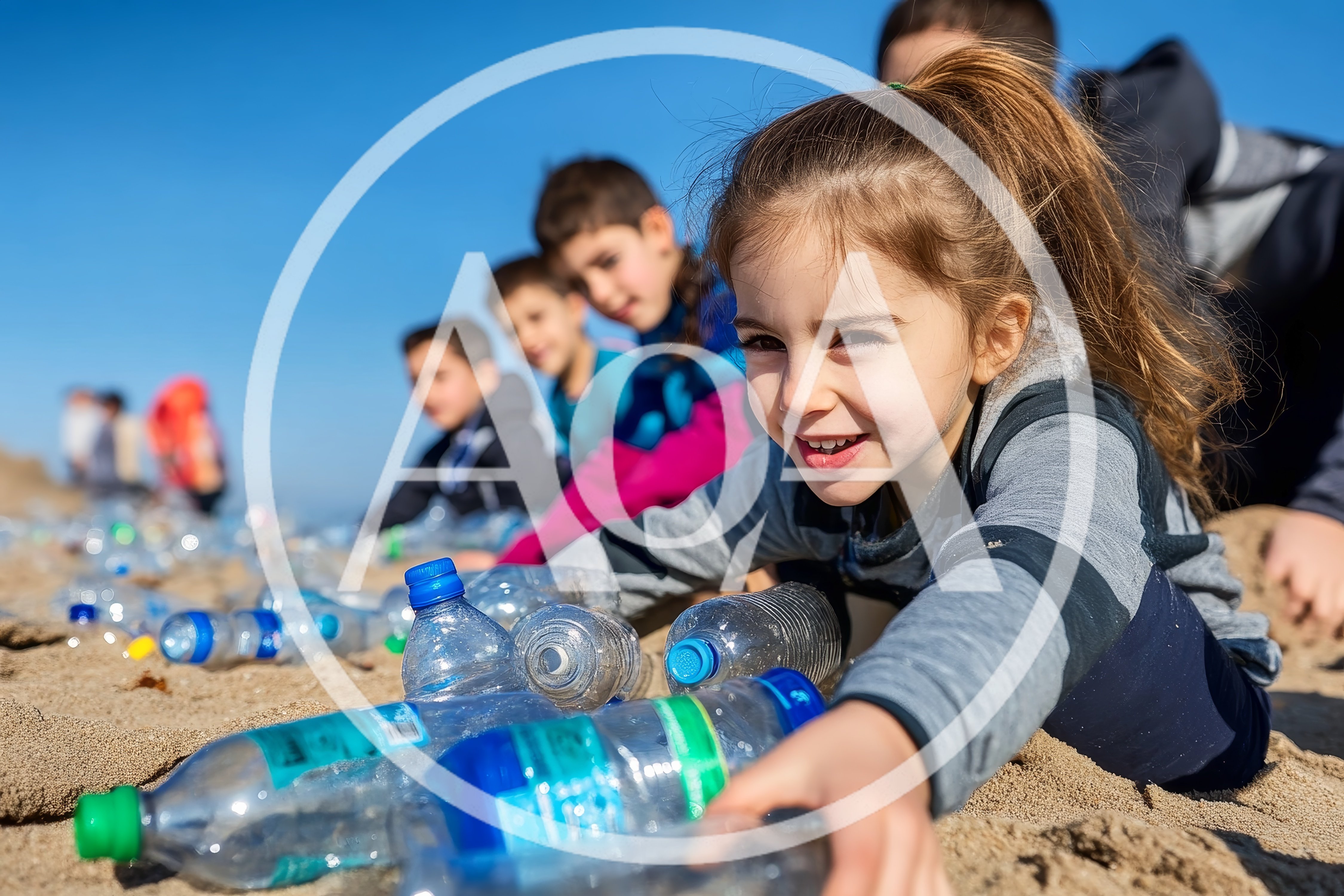 Children Cleaning Plastic Bottles From Sandy Beach