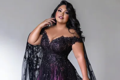 Elegant Plus Size Woman In A Black Lace Gown