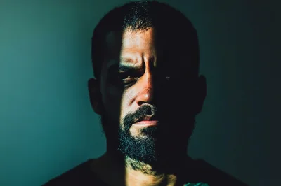 Portrait Of A Man With Dramatic Split Lighting