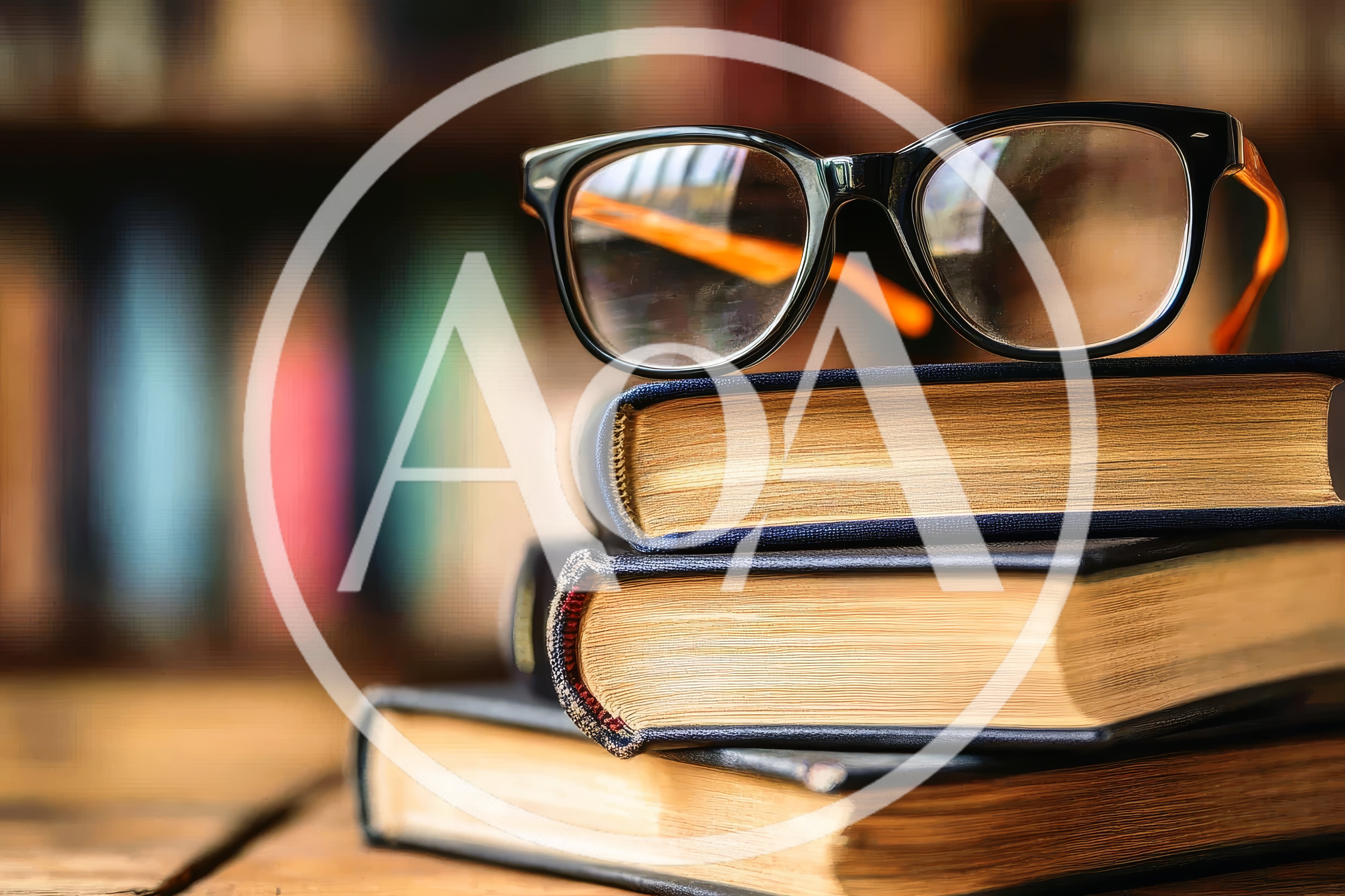 Stack Of Old Books With Reading Glasses